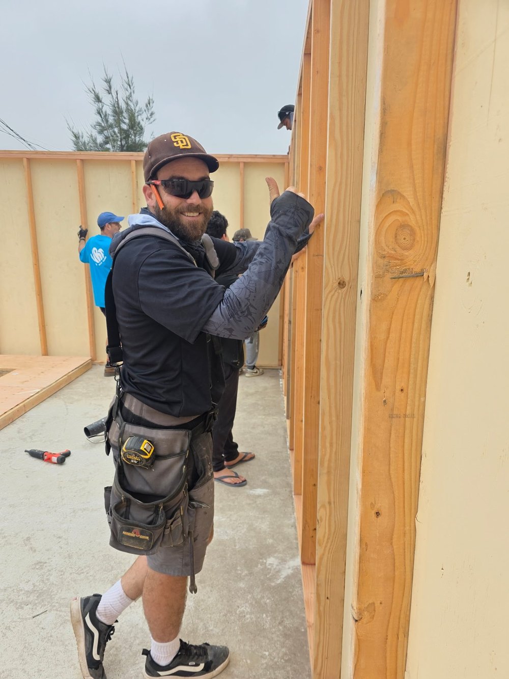 Pat McLoughlin framing a wall on site